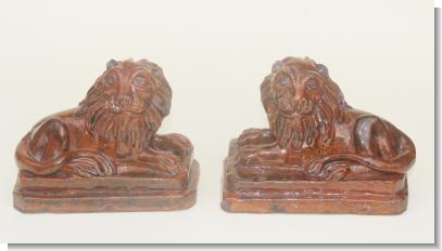 PAIR OF PILL POTTERY LIONS, SWANSEA c.1860