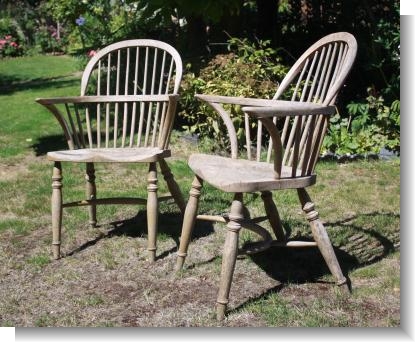 PAIR of WEATHERD WINDSOER CHAIRS