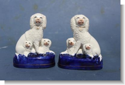 PAIR of SMALL STAFFORDSHIRE DOG GROUPS .1880