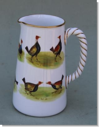COCK FIGHTING JUG, circa 1870