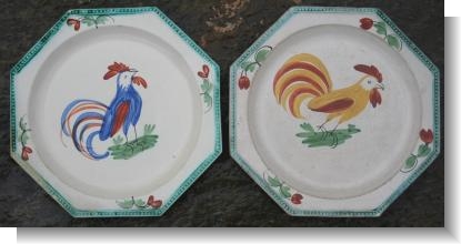 TWO FRENCH CREAMWARE COCKErREL PLATES. c.1790