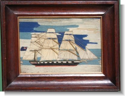A CHARMING SMALL SHIP WOOLWORK PICTURE.